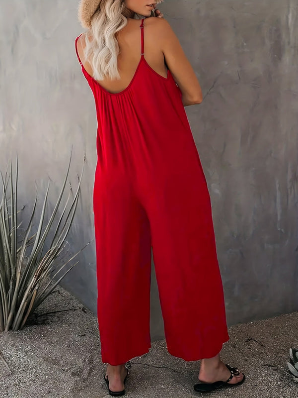 Elegante schwarze damen-jumpsuit mit weitem bein und spaghetti-träger