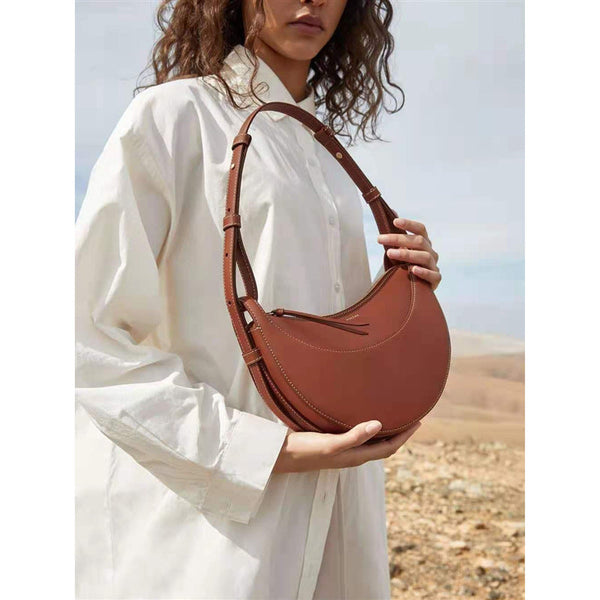 Dame handtasche stilvolle umhängetasche - schicke halbmond-form in braun für den alltag