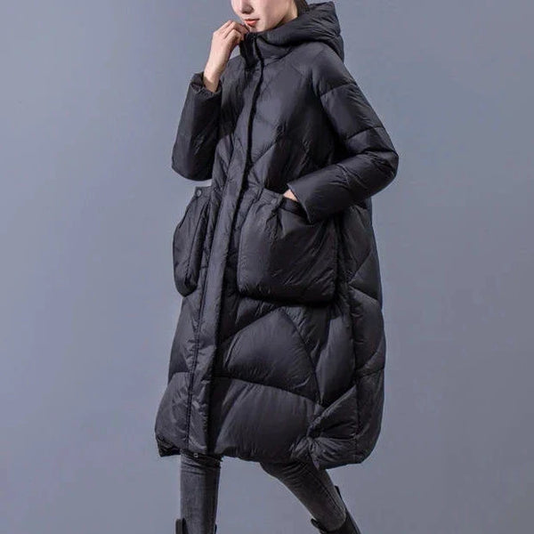 Gemütlicher wintermantel - stylische lange schwarze damen-pufferjacke