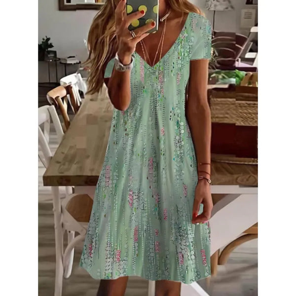 D'midi-kleid für frauen mit elegantem v-ausschnitt in grün mit blumenmuster – für sommerausflüge und gartenfeste