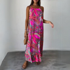 D'maxi-kleid für frauen - luftig und lässig für de summer mit lebhaftem tropische druck