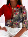 Damen bluse mit pfauenfeder-druck - elegante musterbluse