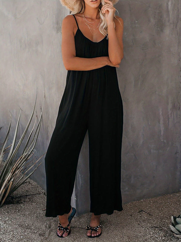 Elegante schwarze damen-jumpsuit mit weitem bein und spaghetti-träger