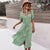 Blumiges sommerkleid - schickes midi-kleid für damen mit knopfleiste