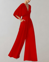 Weitgeschnittene jumpsuit - stilvolles outfit für besondere anlässe