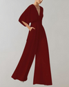 Weitgeschnittene jumpsuit - stilvolles outfit für besondere anlässe