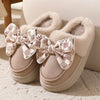 Warme Hausschuhe – Damen Slipper mit Plüschfutter und Schleifendesign