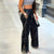 Faux-hosen - stilvolle schwarze damenhosen mit perlendetails