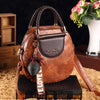 handtasche – stilvolli Damenschultertasche mit dekorativem Detail