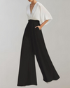 Weitgeschnittene jumpsuit - stilvolles outfit für besondere anlässe