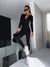 Damen sport jumpsuit mit langem arm und reissverschluss – elegantes schwarzes freizeit- oder sportoutfit