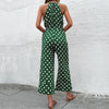 Grüner pünktli jumpsuit - trendy halterneck design für damen