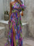 Fliederfarbiges maxikleid mit floralem druck und einem träger