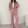 Maßgeschneiderter rosa blazer und hose ensemble