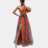 Elegantes maxi-kleid für frauen mit asymmetrischem schnitt in gelb für den abend - leicht fliessender stoff mit hohem schlitz