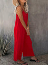 Elegante schwarze damen-jumpsuit mit weitem bein und spaghetti-träger