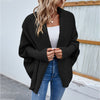 Oversized gestrickte damenjacke – lockere passform mit grossem kragen und mausärmeln