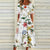 Blumiges sommerkleid - weisses damenkleid mit lebhaftem blumenmuster